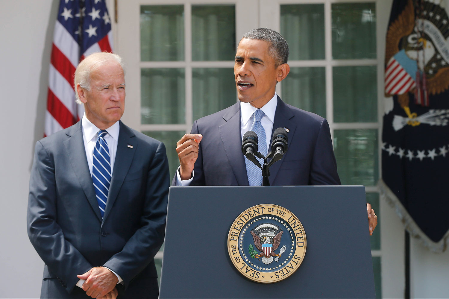 President Barack Obama stands with Vice President Joe Biden as he makes a statement about Syria in the Rose Garden at the White House in Washington Aug. 31, 2013.