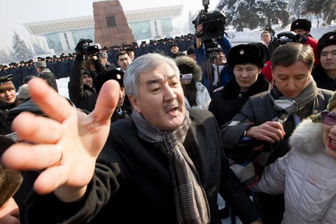 Kazakhstan's opposition leader Amirzhan Kosanov, secretary-general of the Social Democrats, gestures before a rally in Almaty