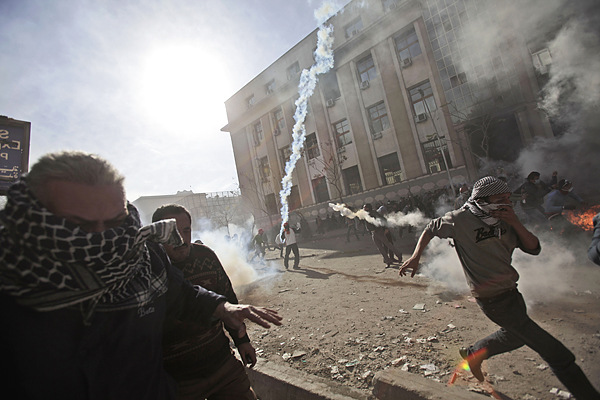 Demonstrators and police clash over the deaths in Port Said