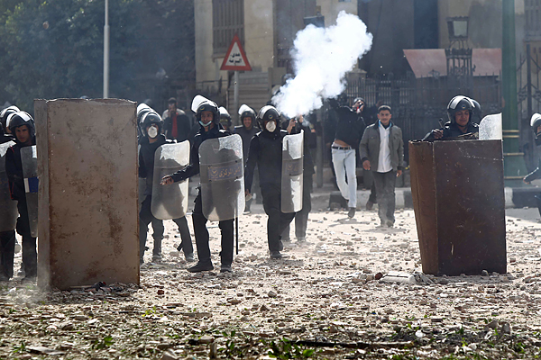 Demonstrators and police clash over the deaths in Port Said