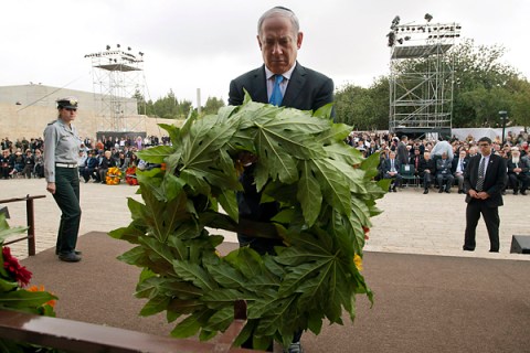 Israel's Prime Minister Netanyahu lays a wreath during an ceremony in Jerusalem