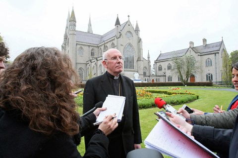 Cardinal Sean Brady speaks to members of the media outside Armagh cathedral in northern Ireland