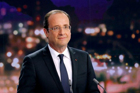 France's President Hollande is seen at the French Television France 2 studios ahead of his appearance on their prime time evening news programme in Paris