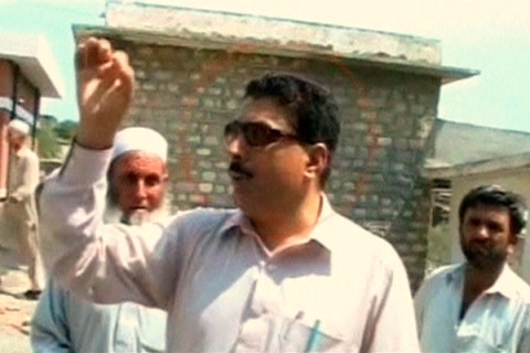 Pakistani doctor Shakil Afridi talks with people in Pakistan