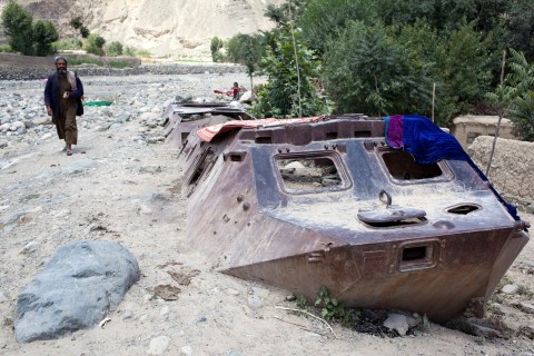Old Soviet armored personnel carriers, tanks and artillery litter the countryside and cities of Afghanistan