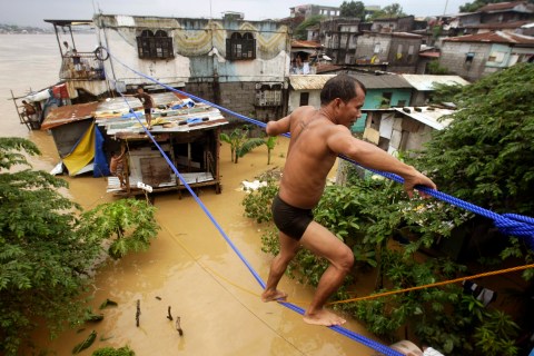 Manila Floods, Displacing Tens of Thousands