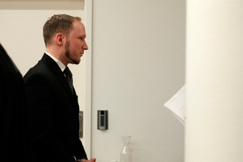 Norwegian mass killer Breivik is escorted out of the the court room at the end of his trial in Oslo Courthouse