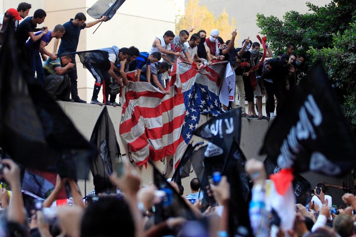 Protesters Destroy Flag at U.S. Embassy in Cairo