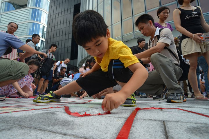 A Boy Colors in Chinese Characters
