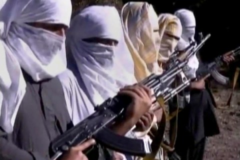 Still image taken from a video shows Pakistani Taliban fighters holding weapons as they receive training in Ladda, South Waziristan tribal region