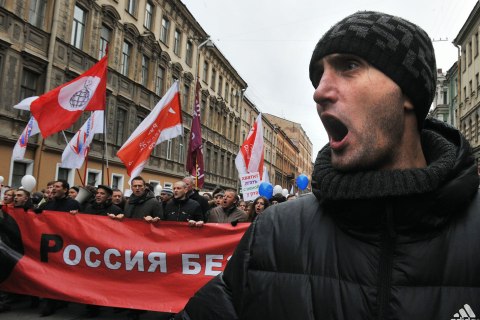 image: Members of Russia's opposition march in central Saint Petersburg, Feb. 25, 2012.
