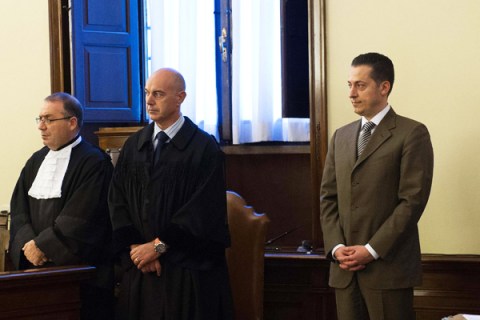 Pope Benedict's former butler Gabriele listens to the court at the Vatican