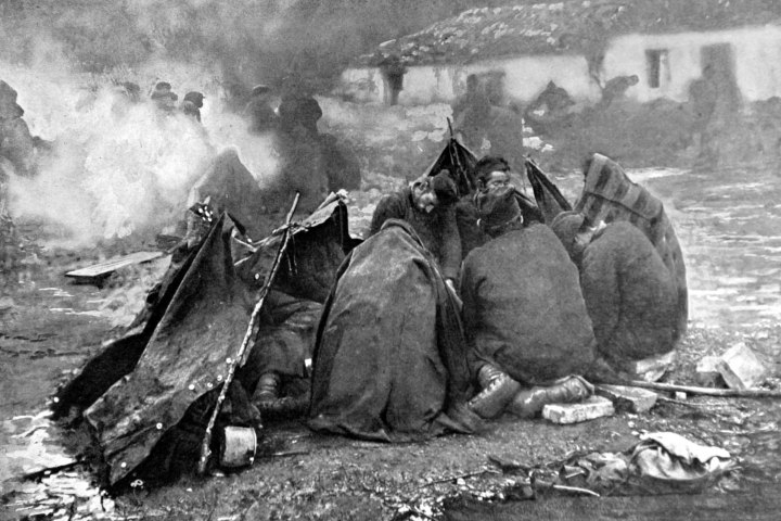 Serbian troops resting in a bivouac after an exhausting day's walk