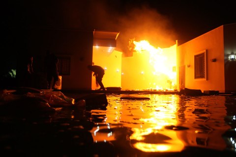 Image: The U.S. Consulate in Benghazi is seen in flames on the night of Sept. 11, 2012.