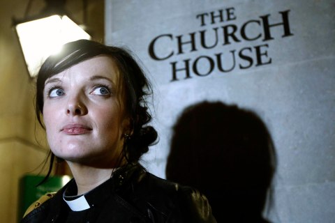 Reverend Sally Hitchiner leaves after the vote for women bishops failed during the Synod at Church House in London