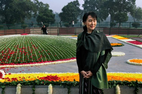 image: Burma's opposition leader and Nobel laureate Aung San Suu Kyi stands after paying floral tribute at the memorial of India's first Prime Minister Jawaharlal Nehru on his birth anniversary in New Delhi, India, Nov. 14, 2012. 