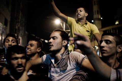 image: Palestinians celebrate a cease-fire agreement between Israel and Gaza in Gaza City, Nov. 21, 2012. 