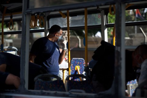image: Emergency services work the scene of an explosion on a bus in Tel Aviv, Nov. 21, 2012.