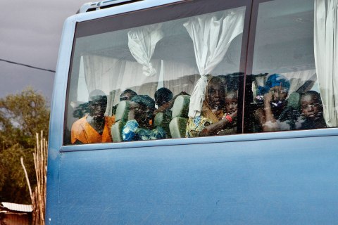 A bus carrying passengers from Gao in Mali's Islamist-controlled north to the capital, Bamako, makes a stop in Mopti, Mali Sept. 27, 2012.