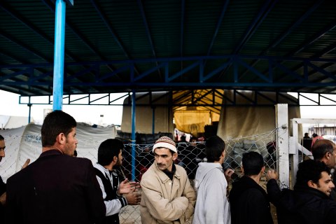 image: Displaced Kurdish refugees from Syria at the Domiz camp near Dohuk, Iraq on Dec. 10, 2012. 