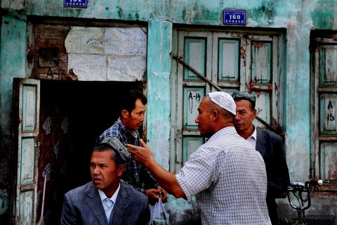 image: Uighur men are seen in the old town Kashgar district, Xinjiang province, China, Sept. 5, 2009.