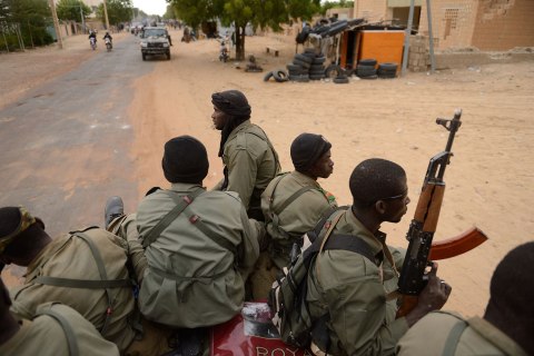 Malian soldiers enter the historic city of Timbuktu,  Jan. 28, 2013. 