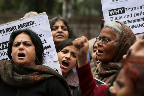 Activists from different women organizations shout slogan against government during a protest, in New Delhi, India on Feb. 4, 2013.