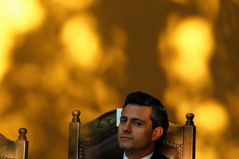 Mexico's President Enrique Pena Nieto attends a ceremony to receive the Keys to the City at the National Museum in San Jose Feb. 20, 2013.