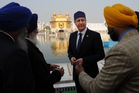 Prime Minister David Cameron is shown around the Golden Temple at Amritsar in Punjab, India.