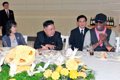 North Korean leader Kim Jong Un, his wife Ri Sol Ju, far left, and former NBA star Dennis Rodman dine in Pyongyang.
