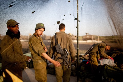Israeli soldiers of the Golani brigade prepare during a military exercise.