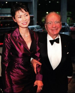 Media magnate Rupert Murdoch (R) and his wife Wend