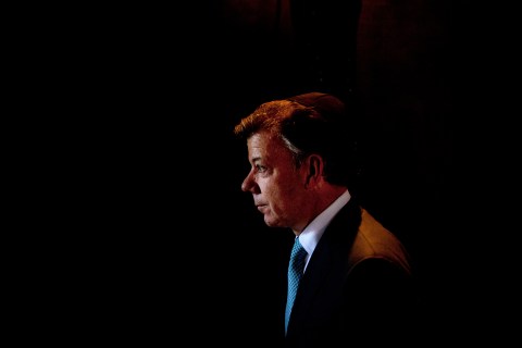 Colombia's President Juan Manuel Santos, walks following a ceremony at the Hall of Remembrance at the Yad Vashem Holocaust memorial, in Jerusalem, Monday, June 10, 2013. 