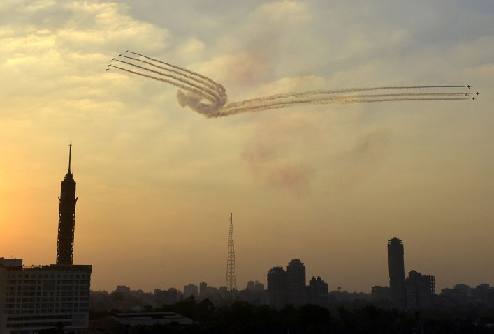 Egyptian Air Force jets perform over Cairo, one day after the announcement of a presidential handover in Egypt, July 4, 2013. 