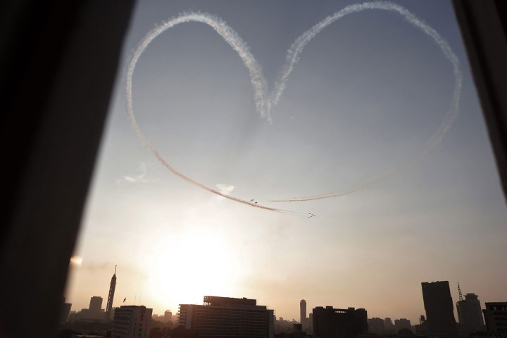 Planes of the Egyptian Air force draw a heart as they perform over Tahrir square, Cairo, Egypt, 05 July 2013. 