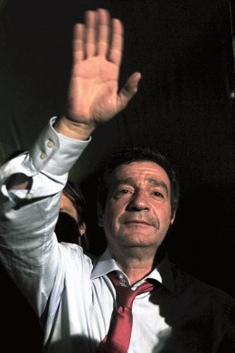 Newly elected mayor of Athens, George Kaminis waves to gathered crowds, on Nov. 14, 2010.