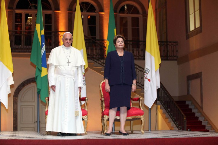 Pope Francis poses with President Dilma Rousseff after a welcoming ceremony for the Pope in Guanabara Palace in Rio de Janeiro