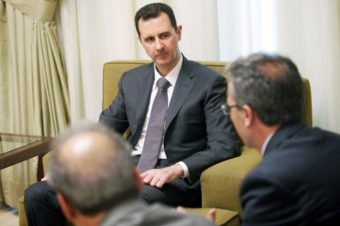 Syria's President Bashar Assad gives an interview with the al-Thawra newspaper in Damascus, July 3, 2013.