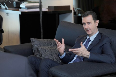 Syrian President Bashar al-Assad receives an interview with Russian newspaper Izvestia in Damascus, on Aug. 26, 2013.