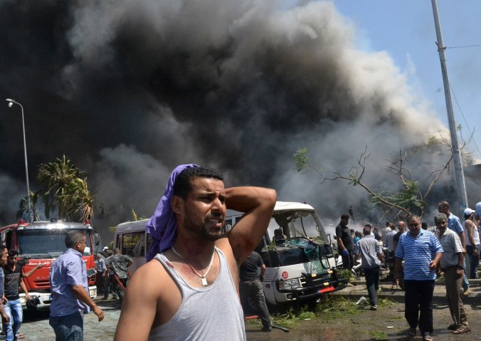 A Lebanese man at the scene of an explosion in Tripoli, Lebanon, on Aug. 23, 2013.