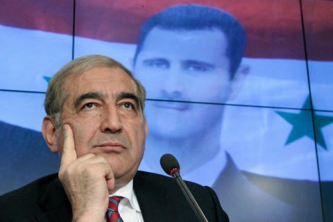 Jamil, Syria's deputy prime minister for economic affairs, listens during a news conference in Moscow