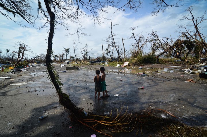 Two young boys look at the devastation in the aftermath of typhoon Haiyan on Nov. 10, 2013 in Tacloban City, Leyte, Philippines.