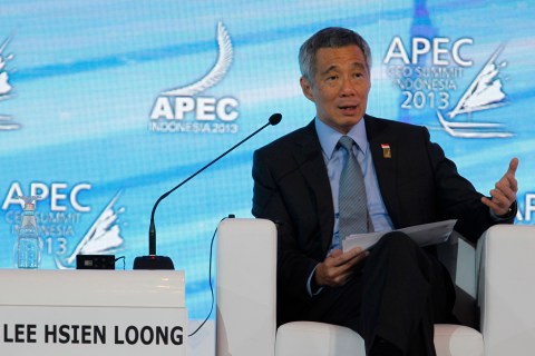 Singapore's Prime Minister Lee Hsien Loong talks during a dialogue session at the Asia-Pacific Economic Cooperation (APEC) CEO Summit in Nusa Dua