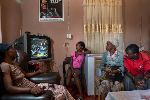 People, tv, television, watching, Death, Horizontal, South Africa, Waiting, Politics, President, Capital Cities, Nelson Mandela, Human Interest, Former, funeral