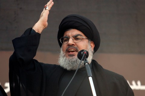 Lebanon's Hezbollah leader Sayyed Hassan Nasrallah addresses his supporters during a religious procession to mark Ashura in Beirut's suburbs, on Nov. 14, 2013.