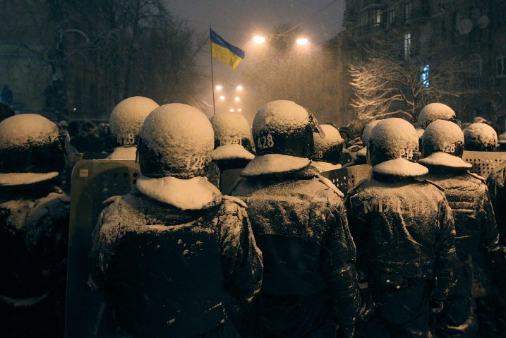 Interior Ministry personnel block a street during a gathering of supporters of EU integration in Kiev