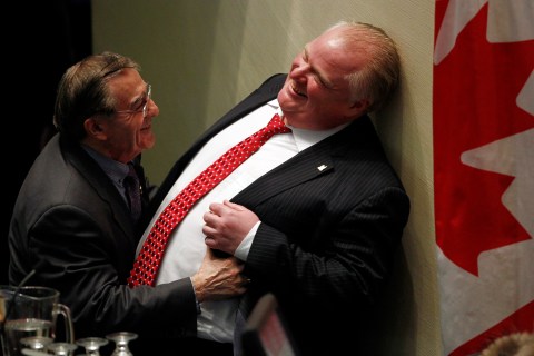 Toronto's Chief Budget Officer Councillor Di Giorgio shares a moment with Toronto Mayor Ford during a budget meeting at City Hall in Toronto